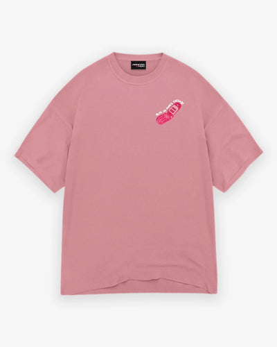 Pink t-shirt with a small graphic on a white background